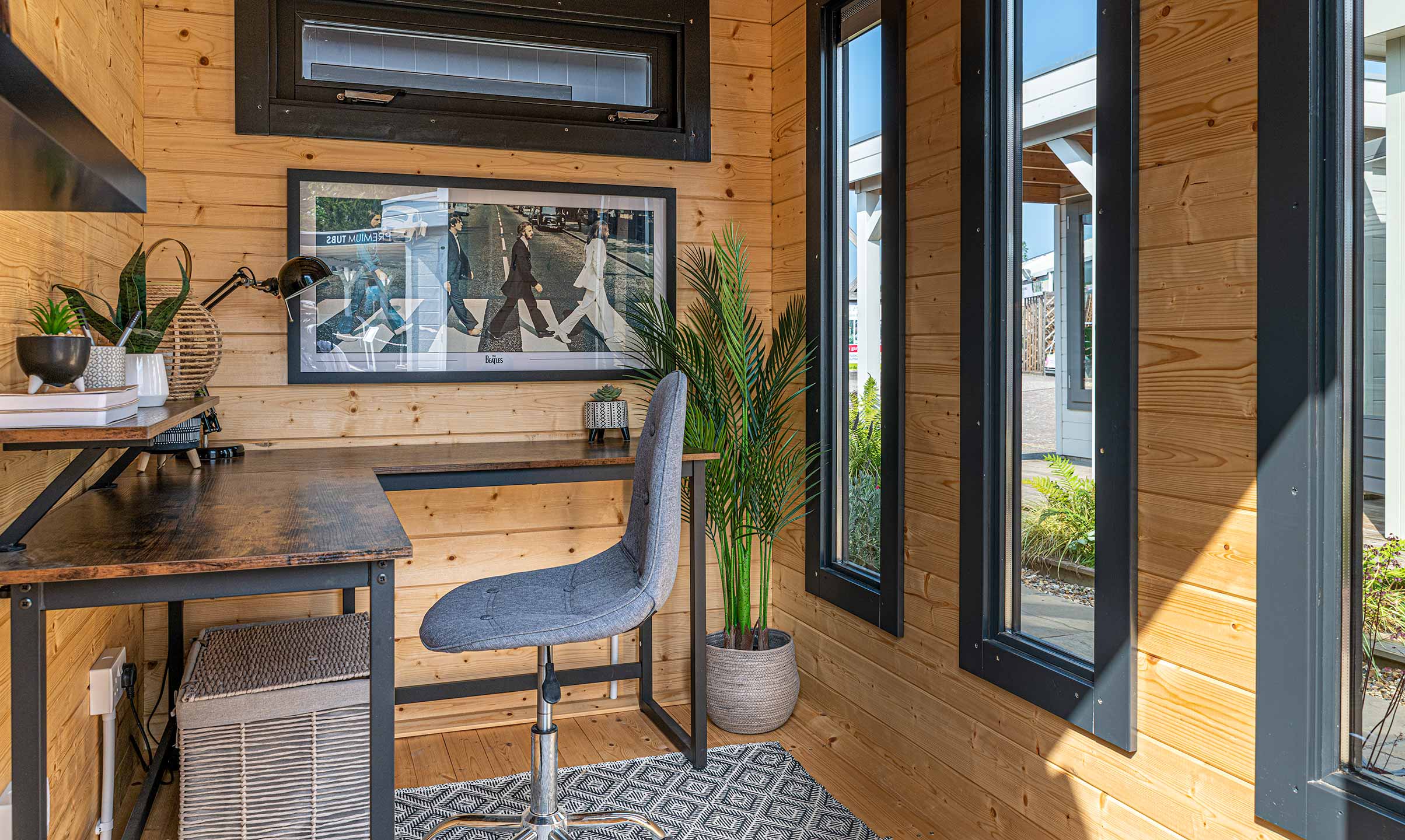 Contemporary Garden Office with Integrated Storage Wall