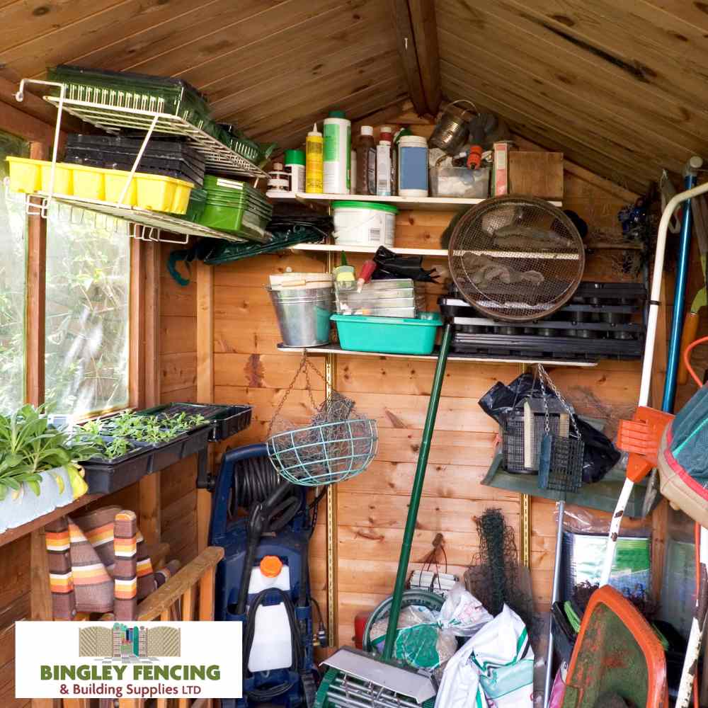Garden storage shed with integrated shelving